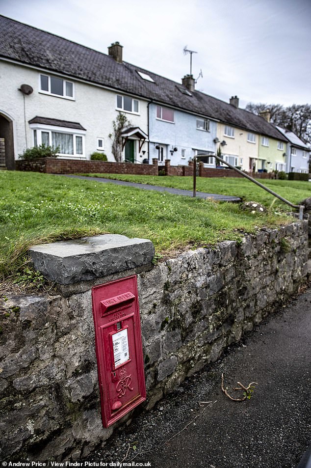 Pictured: A mini Post Box on Ffordd Meigan built into the stone walls