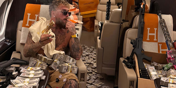 Jake Paul forgets broken jaw as he flaunts stacks of cash on private jet & shares inspirational message after Joshua KO