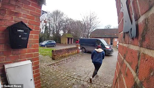 But she then appears to exchange this for one that is already outside, running off with it beneath her navy blue jacket