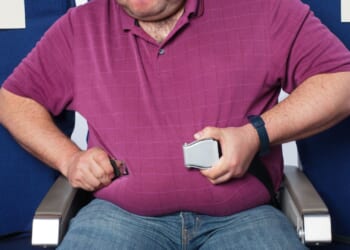 Top airline will make overweight passengers pay for two plane seats from next year