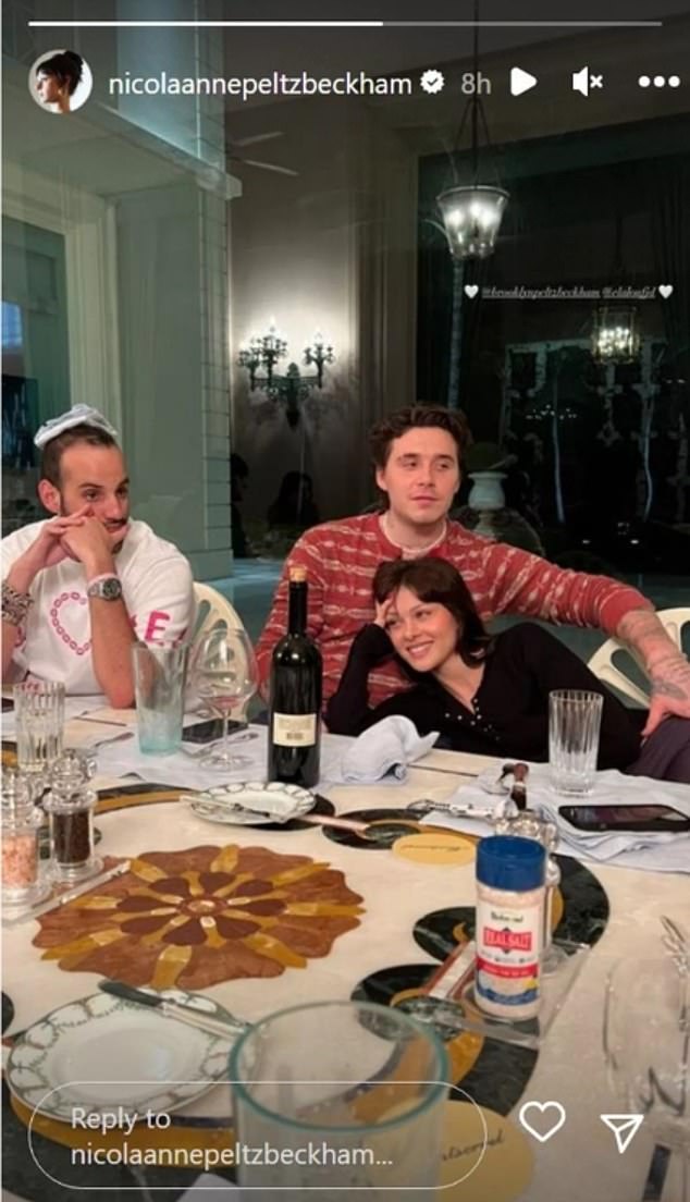 He has previously given insight into Hanukkah at the Peltz compound, sharing sweet snaps cosying up to his wife over the eight night-long religious celebration in 2023 (pictured)