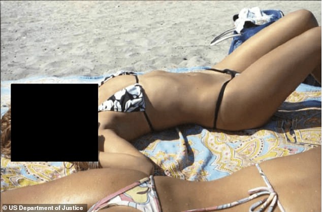 Women in bikinis are pictured on a beach in files released by the DOJ
