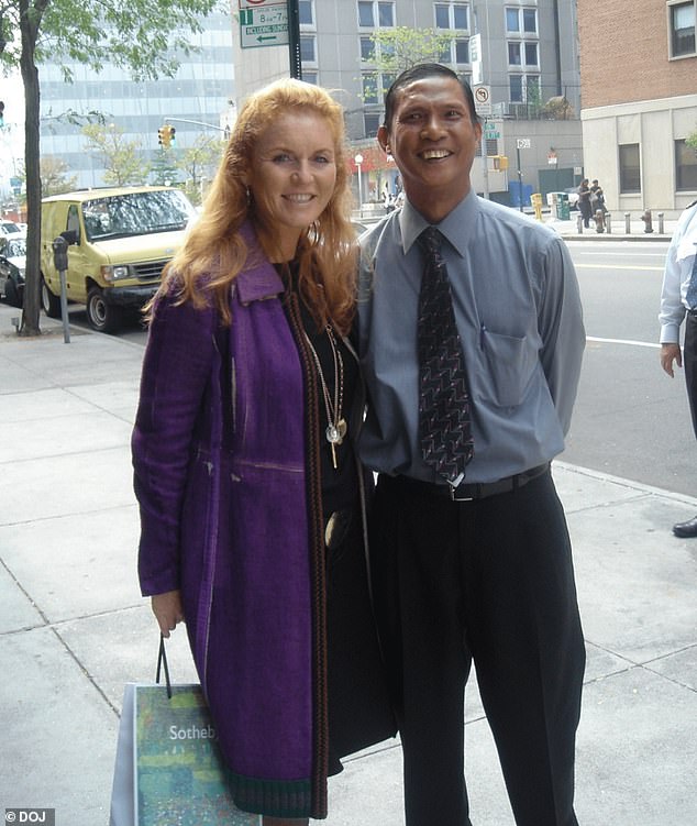 Sarah Ferguson is pictured holding a shopping bag that appears to be from Sotheby's, a fine art dealer