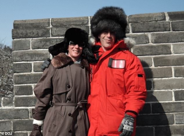 Jeffrey Epstein and Ghislaine Maxwell are pictured in fur hats as they pose for a photo