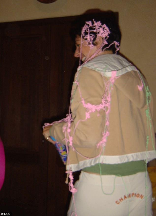 Ghislaine Maxwell is pictured covered in streamers