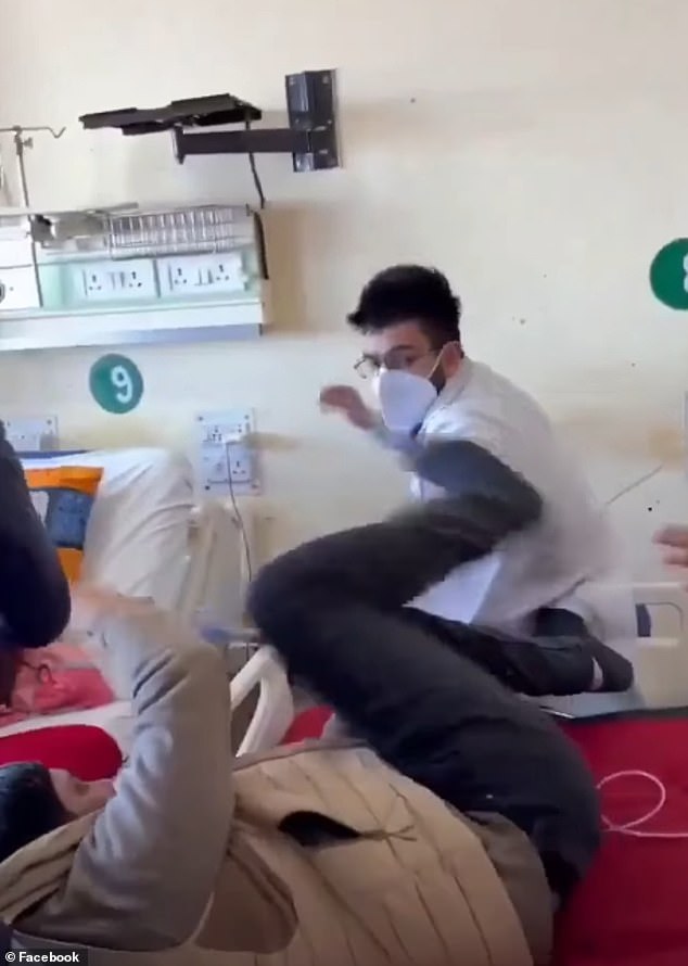 The video quickly gained traction online, and the doctor can be seen repeatedly throwing punches at Mr Panwar as he attempted to shield himself