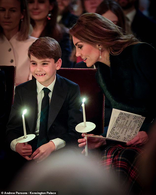 In adoring scenes, Kate could be seen speaking to her youngest son, while he sat with a cheeky grin on his face