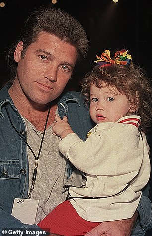 Billy Ray and baby Miley in 1994