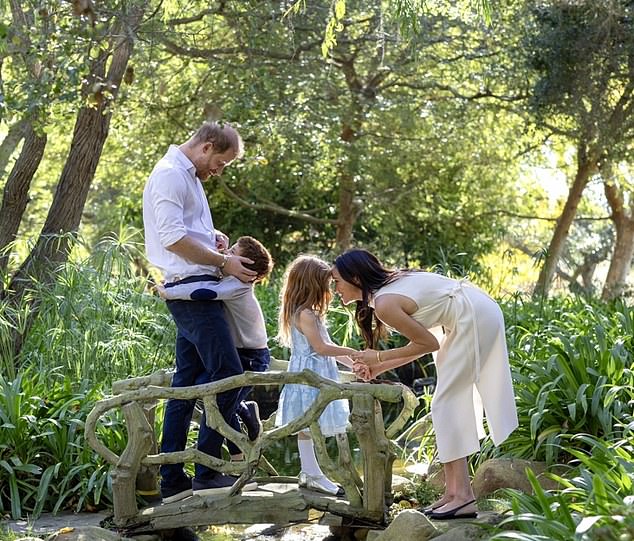 Meghan has released this new family portrait on Instagram to mark the start of Christmas, although she used the word 'holidays'