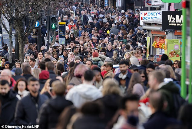 Christmas shoppers on Oxford Street, London, on December 20, 2025. Experts have predicted £3.4billion will be spent on last minute shopping