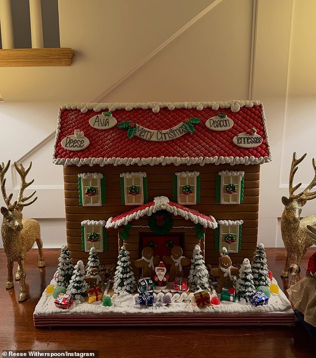 Witherspoon included a snap of a fancy gingerbread house iced with her name as well as her three children's names on the sugary roof