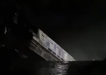 Moment 164ft sinkhole swallows canal boat in 'major incident' as 10 people rescued