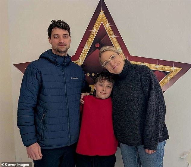Louis Tremblay, nine, (centre, pictured with dad Adam, left, and mum Lauren, right) was left distraught after a rogue delivery driver threw his Christmas present in the bin