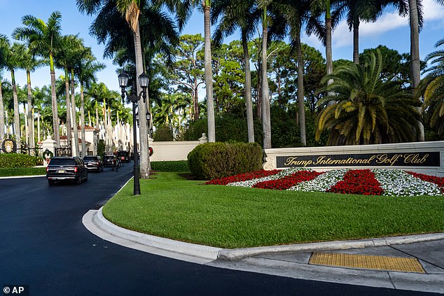The motorcade for President Donald Trump arrives at Trump International Golf Club, Tuesday, Dec. 23, 2025, in West Palm Beach, Fla. (AP Photo/Alex Brandon)