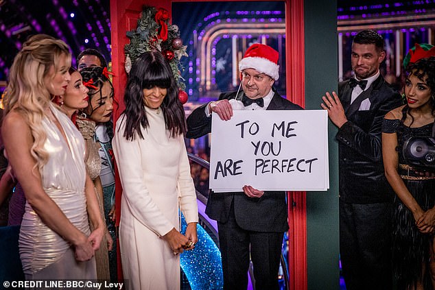 Claudia receives a special Love Actually-inspired parting gift from the show's musical director Dave Arch