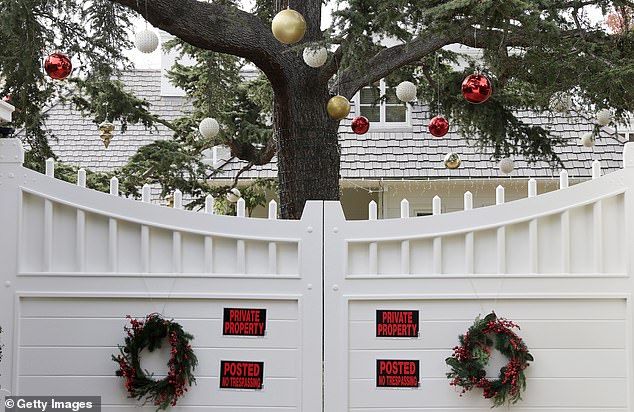 Holiday decorations are visible at the Reiners' home two days after they were found dead inside