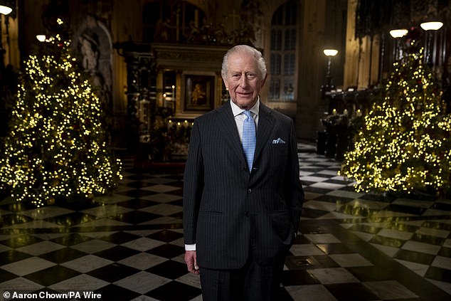 Smartly dressed in a pinstriped suit, with a matching blue tie and pocket handkerchief, King Charles appears happy and relaxed during the broadcast which was filmed earlier this month