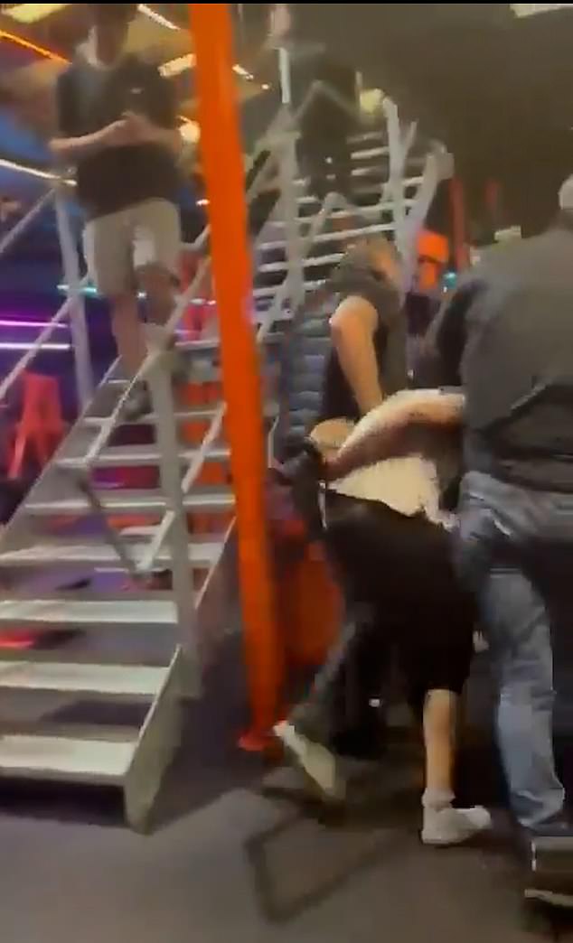 Counter terrorism officers, armed with pistols and wearing bandanas to cover their faces detained Bilel Saadaoui, handcuffing him and walking him out of the gym