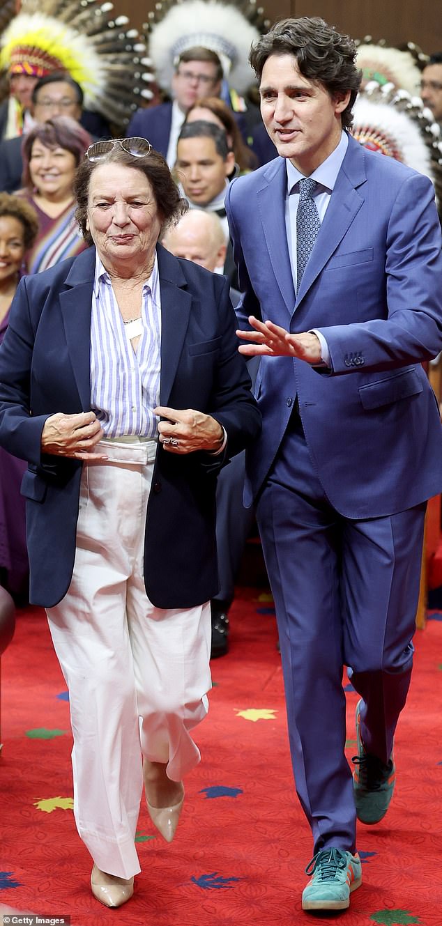 The former Canadian PM, pictured with his mother Margaret, wore a pair of turquoise and orange Adidas Gazelles at King Charles¿s historic address to the Canadian parliament in May