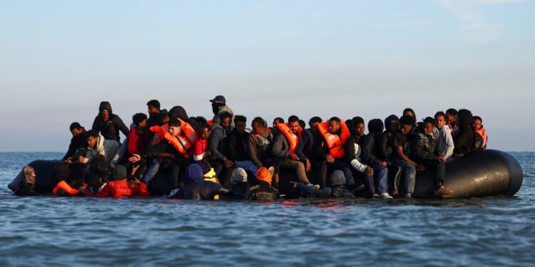 Fury as more than 36,000 illegal migrants will spend Christmas in hotels paid for by YOU