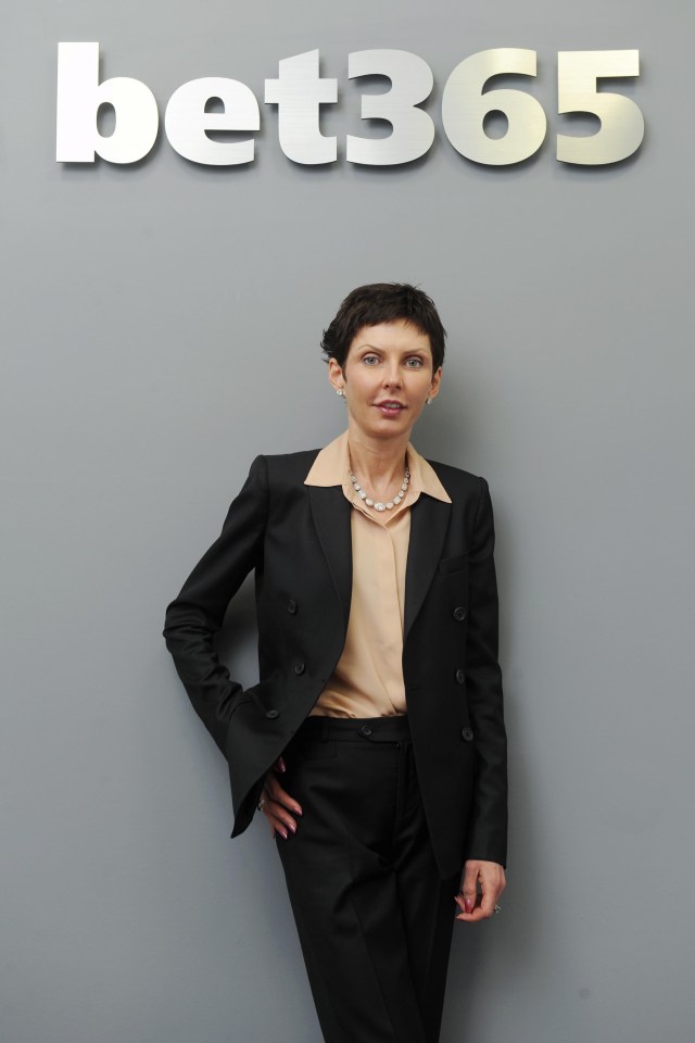 Denise Coates, Bet365 boss, in front of a Bet365 sign.