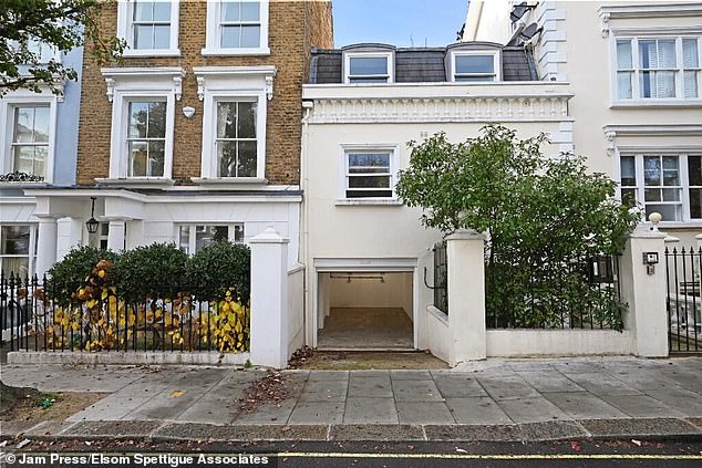 It is set back from the road and down a slight slope