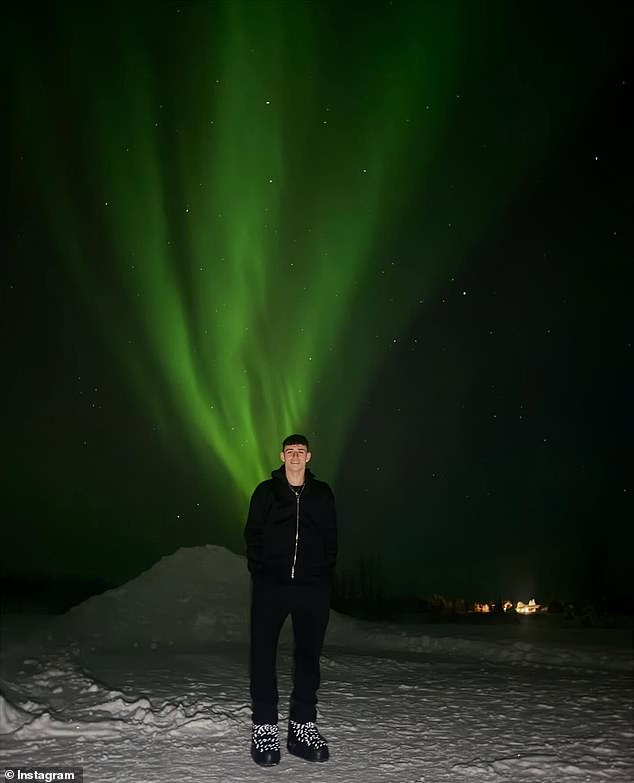 Stunning photos showed the footballer with a backdrop of the Northern Lights
