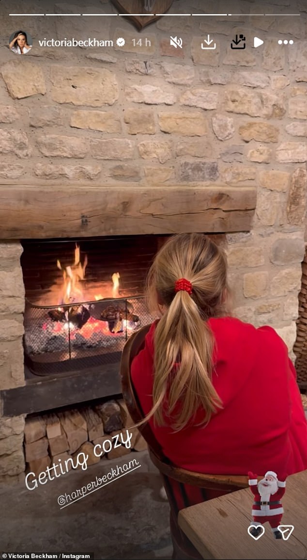 Also celebrating Christmas Eve was Victoria Beckham, who shared a snap of her daughter Harper relaxing by the fire
