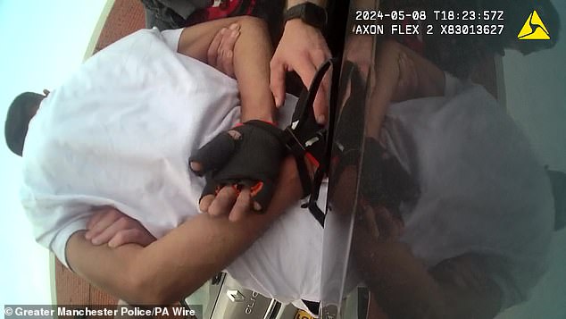 Helmet camera footage since released by police shows he was still wearing his weightlifting gloves at the time of his arrest