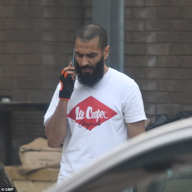 Bilel Saadaoui pictured outside the gym in a surveillance photograph taken by counter-terror police - minutes before armed officers swooped