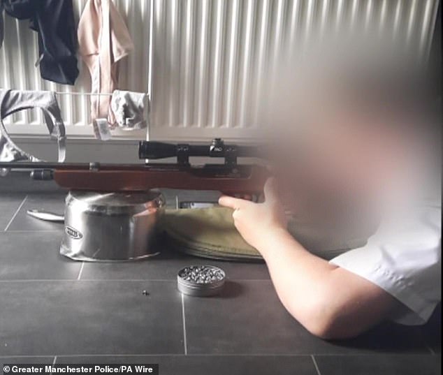 He filmed his teenage stepson - who was with him at the gym when he was arrested - firing a BB gun, set to a religious song praising Islamic State