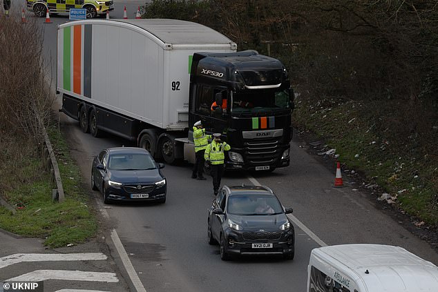 The M2 in Kent is closed westbound after a car overturned in a crash sparking travel chaos on Christmas Eve