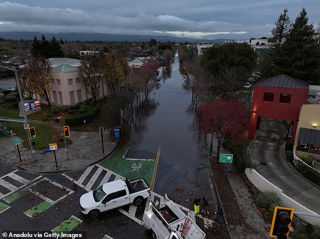 The holiday period is forecast to be a washout for the Golden State this year, with meteorologists warning that up to eight inches of rain is expected to hit several areas including Los Angeles County and Santa Barbara (Pictured: Menlo Park, CA, on December 24)