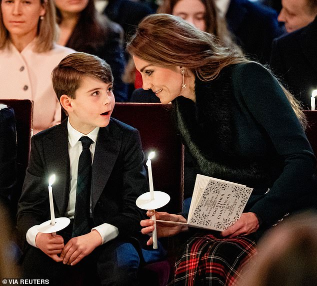 Sweet snaps showed Prince Louis sharing an adorable moment with his mother Kate at her Christmas carol service on December 5