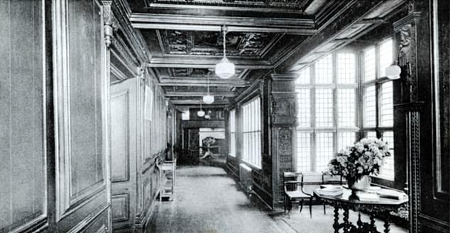 A vintage photo shows the interior long gallery corridor within the property