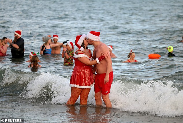 No mistle toe was needed for this couple spotted having a Christmas pash at Helen's Bay