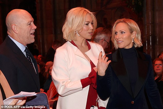 Mike Tindall and Zara Tindall attended the Westminster Abbey carol concert along with actress Hannah Waddingham (centre)