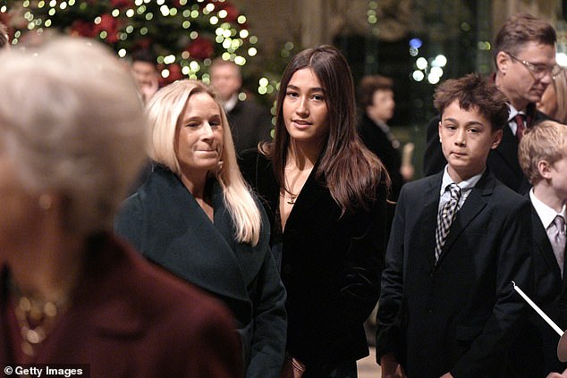 Their daughter, Lady Davina Windsor (left), 48, was in the congregation too, with her two children, Senna Kowhai Lewis (centre), 15, and Tane Mahuta Lewis (right), 13