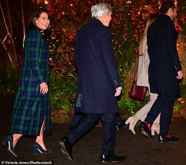 Kate's own family, including her parents Michael and Carole Middleton (pictured attending the service), were present in the congregation too