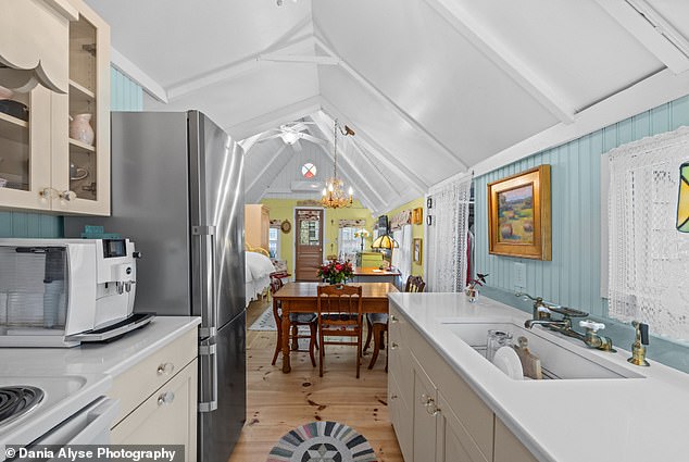 The kitchen flows into the dining room. There is enough space for a dining table, should the home's new owner want to add one