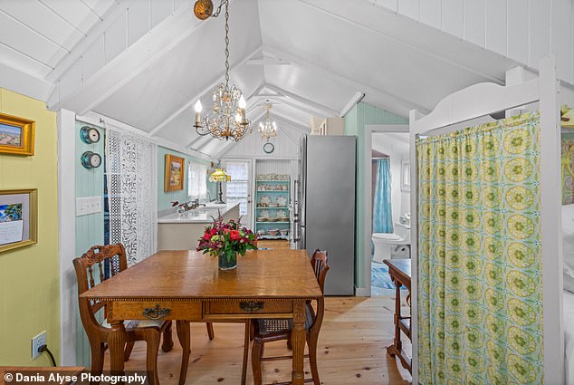 The cottage has ¿upgraded systems and finishes that make it as cozy in winter as it is bright and breezy in summer,¿ per its listing