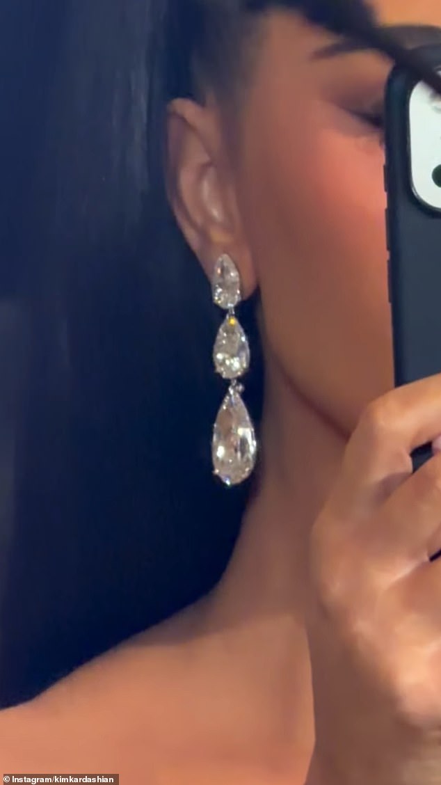 Kim Kardashian teased her outfit for the holiday bash as she uploaded a short reel to her Instagram stories