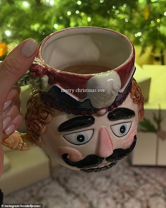 Earlier in the day, Kendall also uploaded a photo as she sipped from a Nutcracker mug in front of a Christmas tree