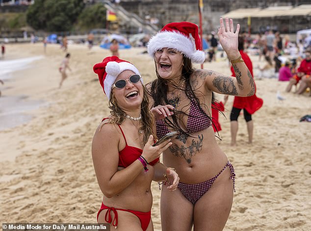 Holidaymakers were all smiles as they spent the day on the beach