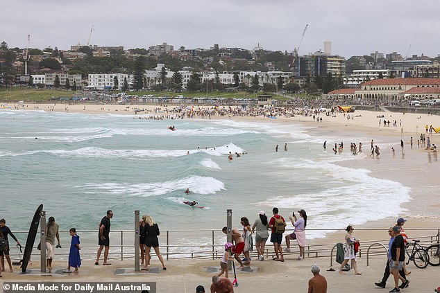Although the beach remained busy, there were quieter scenes this year at Bondi in contrast to sun-soaked celebrations in 2024