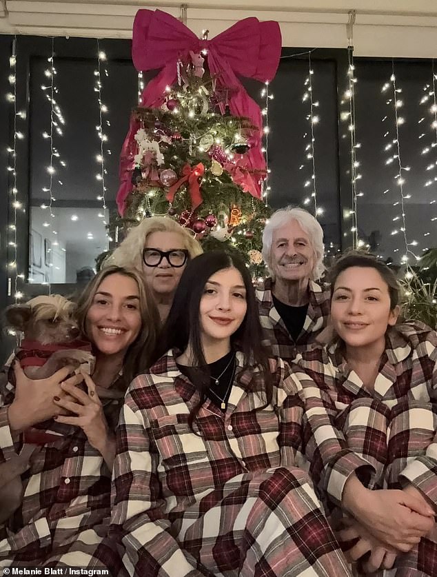 Ahead of her appearance on this years Strictly Come Dancing Christmas special, All Saint's star Melanie Blatt, 50, matched with her family in front of their lavishly decorated tress