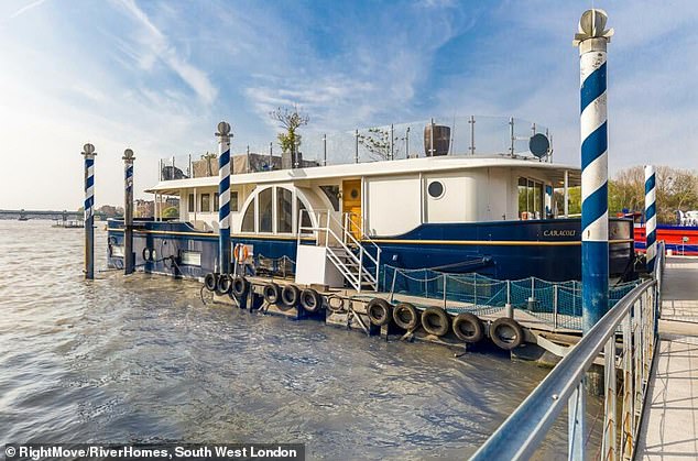 Caracoli is a £2million houseboat moored in Wandsworth, London, on the Prospect Quay riverside