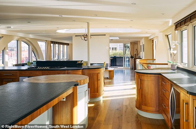 The mooring fees cost £6,000 a year but the houseboat has an impressive 2,605sq ft floor plan