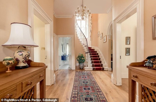 The house features huge sash windows, high ceilings, fine cornicing and ornate plasterwork