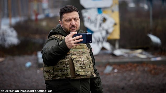 Ukrainian president Volodymyr Zelensky filmed himself taking a picture in the city, despite the Russian claims